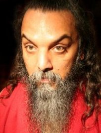 "Enlightened master" Osho Rajneesh with his utterly convincing Satanic look