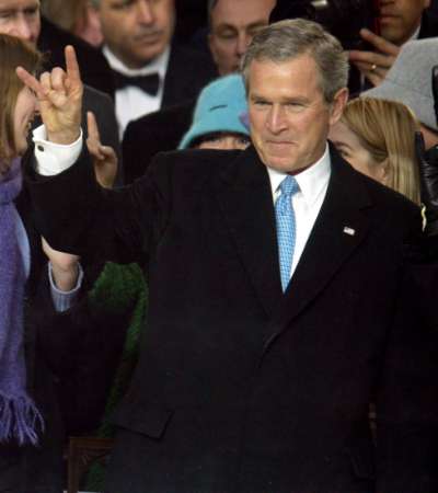 George W. Bush showing the Satanic sign